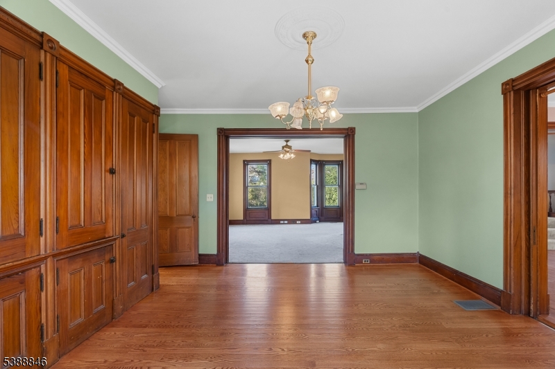 25 Old Turnpike Road Oldwick, NJ 08858 - Photo 16 of 46 a view of a livingroom with wooden floor and chandelier