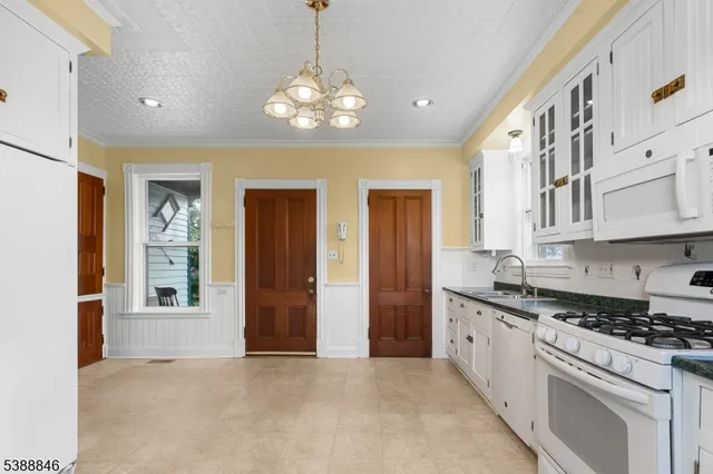 a view of a hallway with an entryway