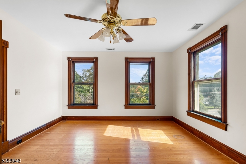25 Old Turnpike Road Oldwick, NJ 08858 - Photo 30 of 46 a view of an empty room with a window and wooden floor