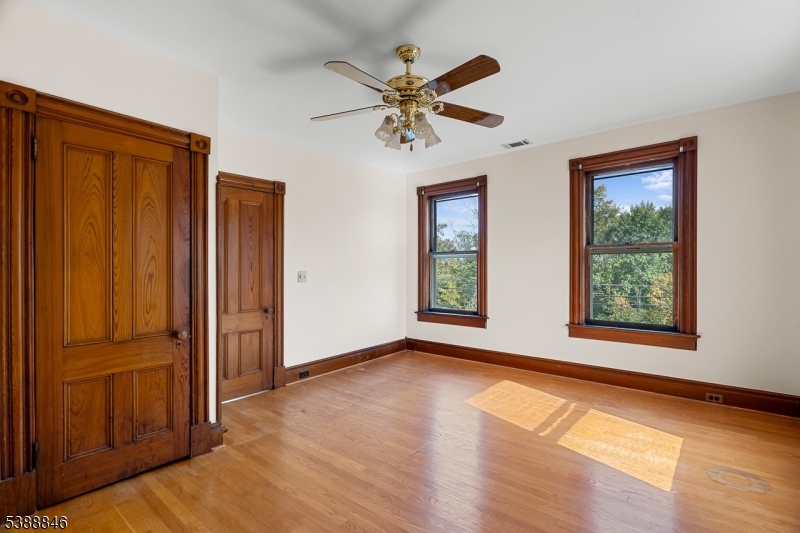 25 Old Turnpike Road Oldwick, NJ 08858 - Photo 31 of 46 a view of an empty room with window and wooden floor