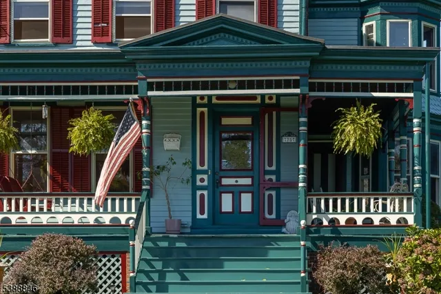 front view of a house with a small deck