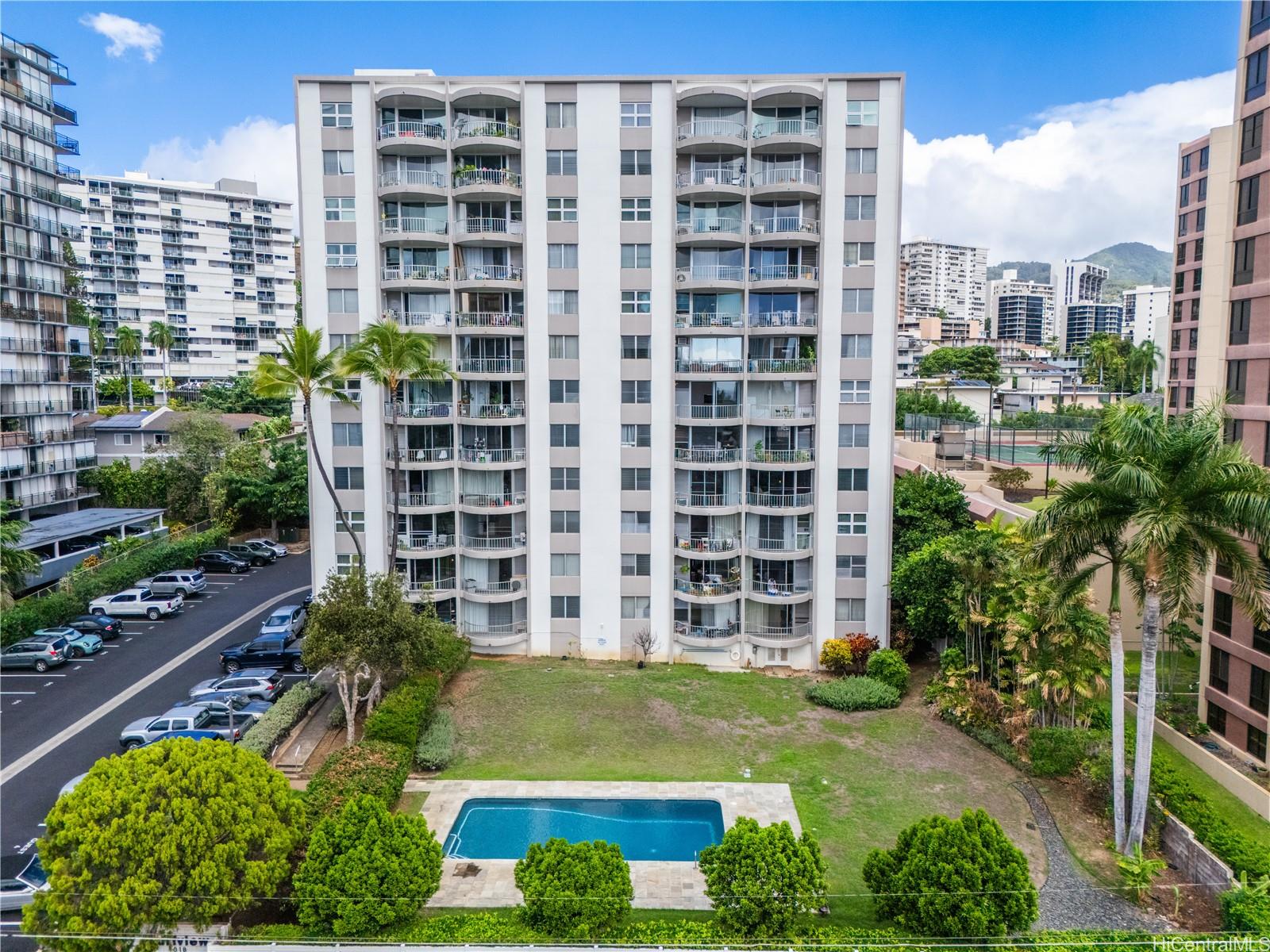 1018 Lunalilo Street, Unit 603 Honolulu, HI 96822 - Photo 12 of 12 a view of a tall building