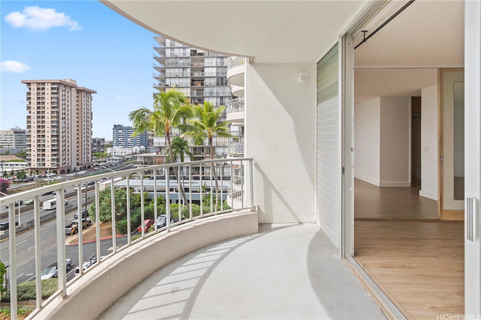 1018 Lunalilo Street, Unit 603 Honolulu, HI 96822 - Photo 8 of 12 a view of balcony with furniture