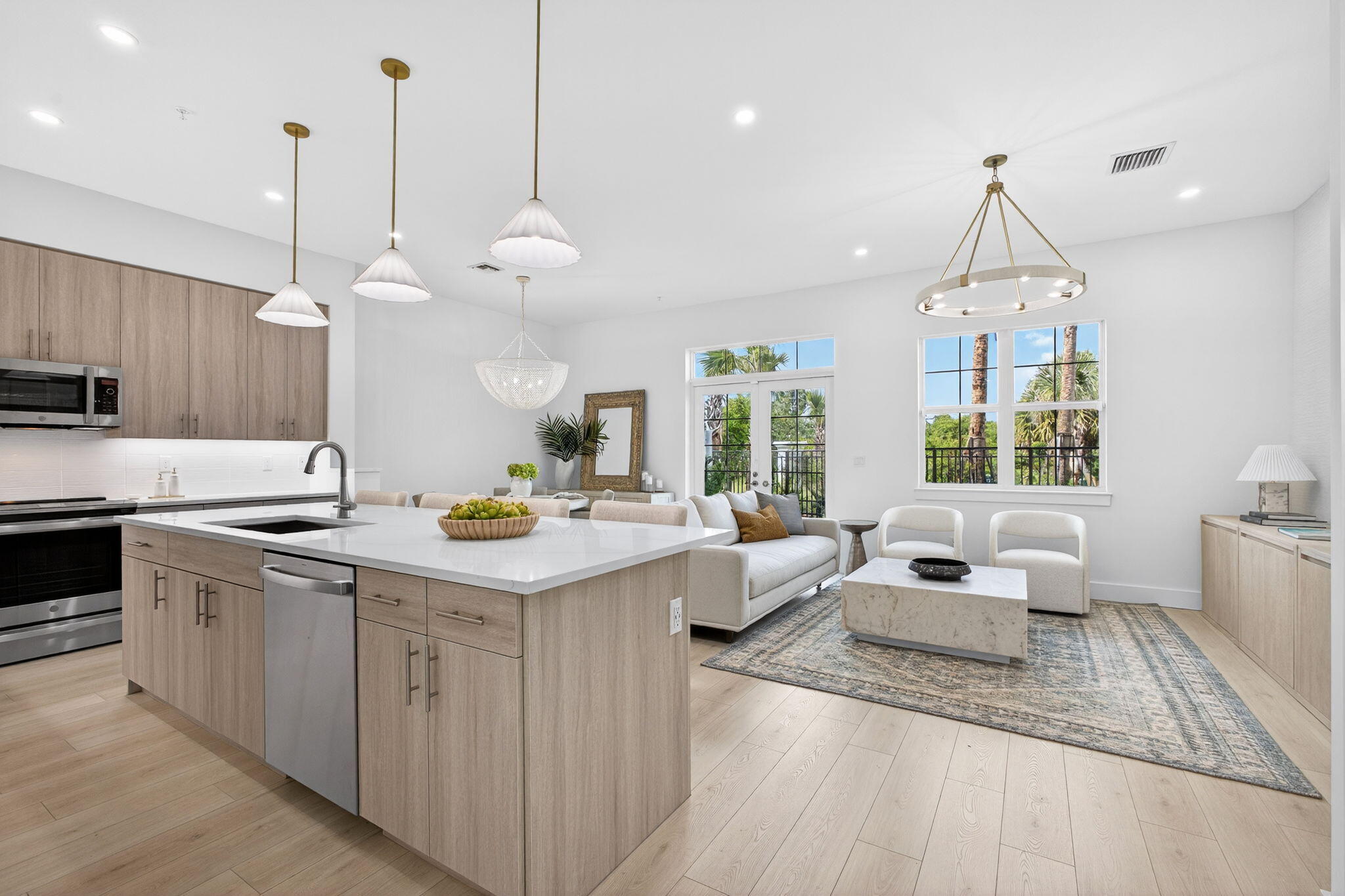 135 Water Pointe Place, Unit 22 Jupiter, FL 33477 - Photo 2 of 55 a kitchen that has a lot of cabinets in it