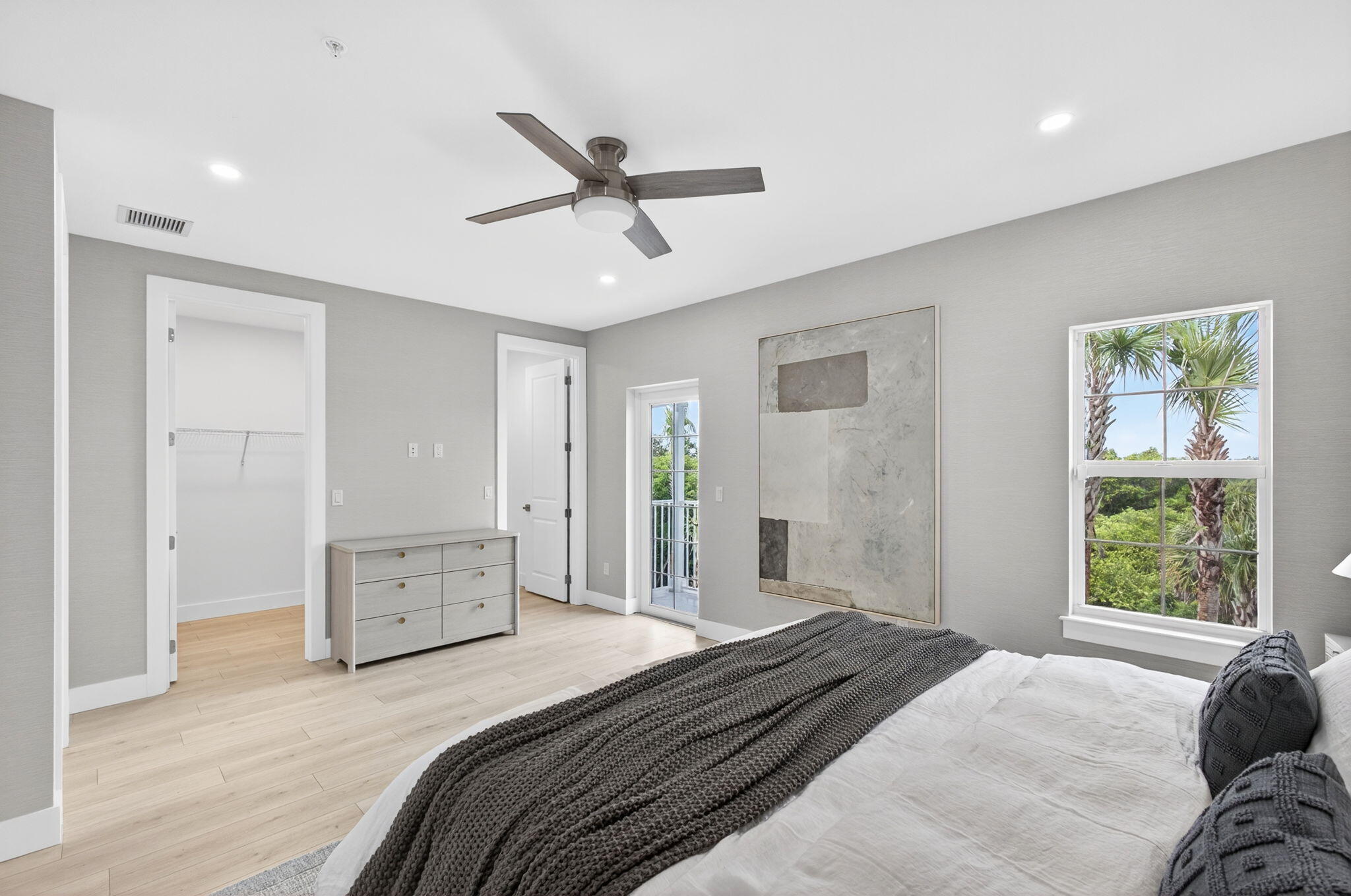 135 Water Pointe Place, Unit 22 Jupiter, FL 33477 - Photo 23 of 55 a bedroom with a large bed and window