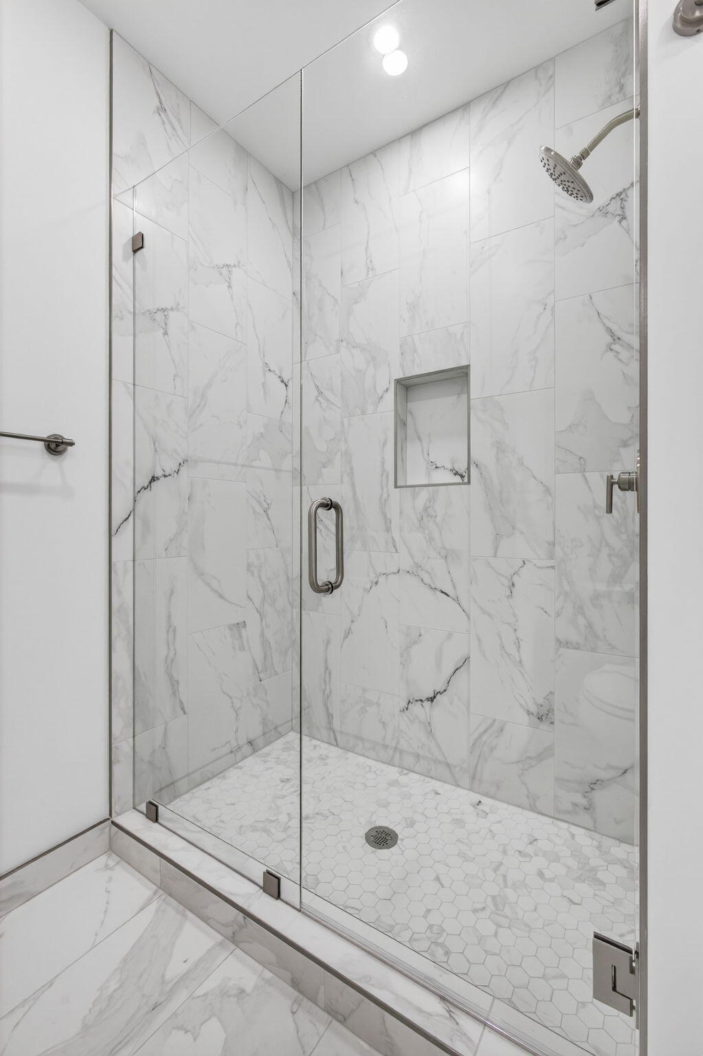 135 Water Pointe Place, Unit 22 Jupiter, FL 33477 - Photo 27 of 55 a bathroom with a shower