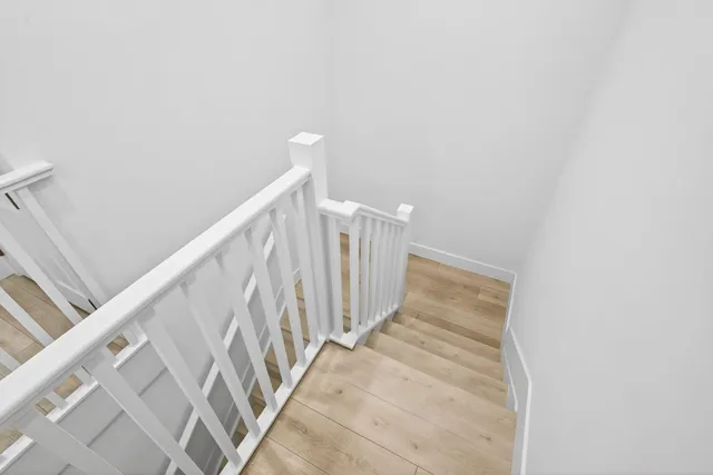 a bedroom with bed and window