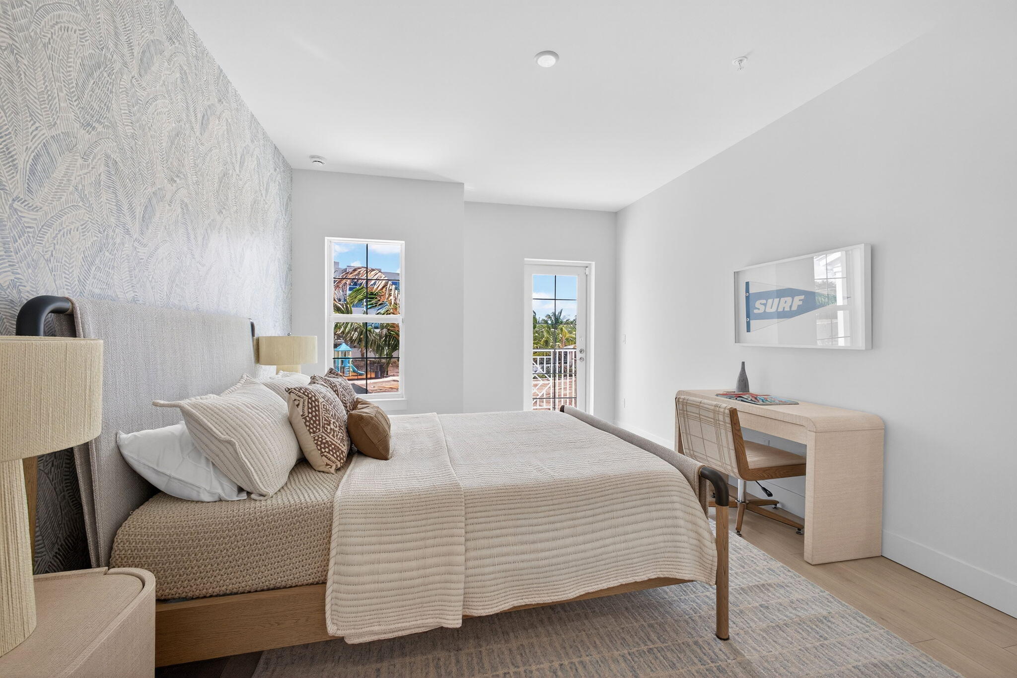 135 Water Pointe Place, Unit 22 Jupiter, FL 33477 - Photo 38 of 55 a bedroom with a bed and a window