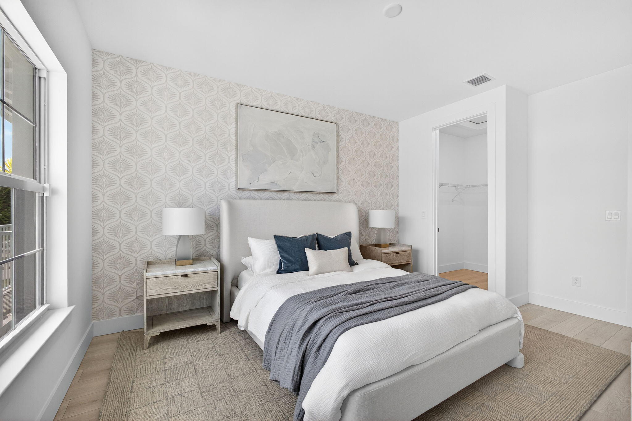 135 Water Pointe Place, Unit 22 Jupiter, FL 33477 - Photo 41 of 55 a bedroom with a bed and a window