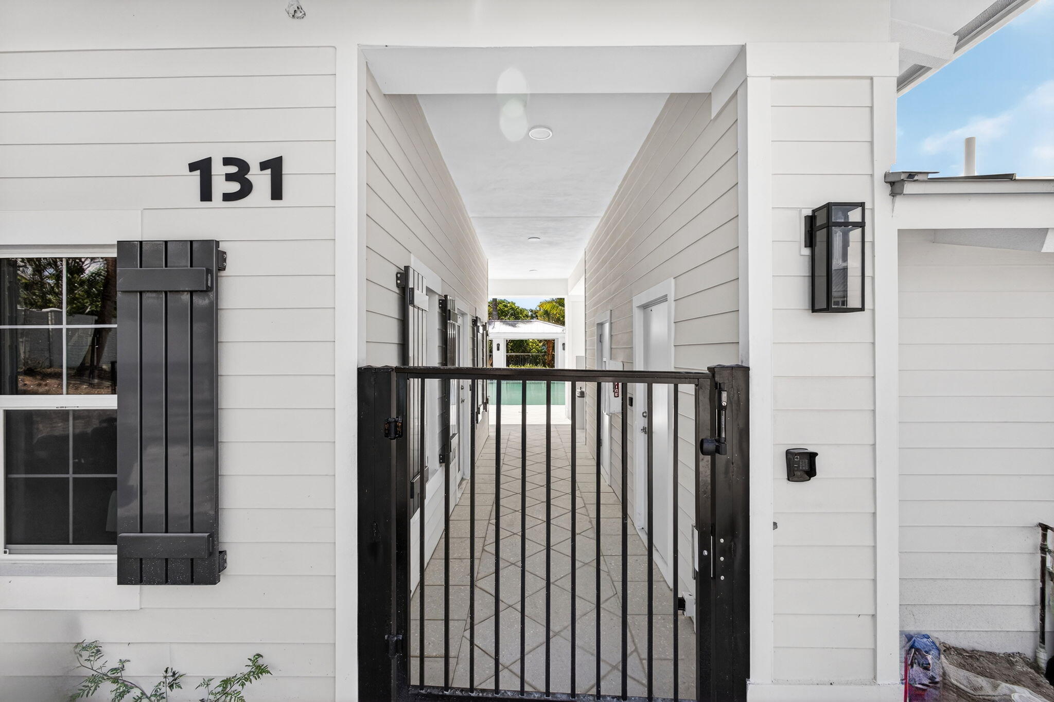 135 Water Pointe Place, Unit 22 Jupiter, FL 33477 - Photo 51 of 55 a view of a hallway with entryway door front of house