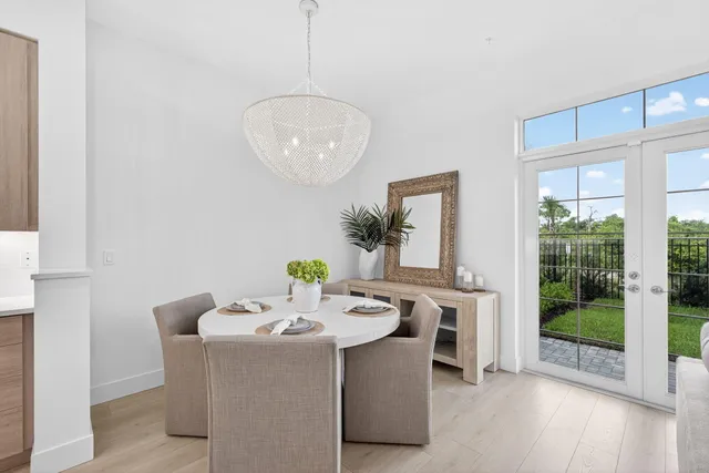 a living room with furniture and a white table