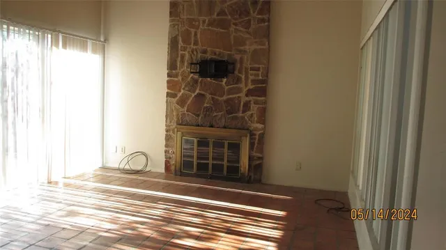 a view of a door and a window