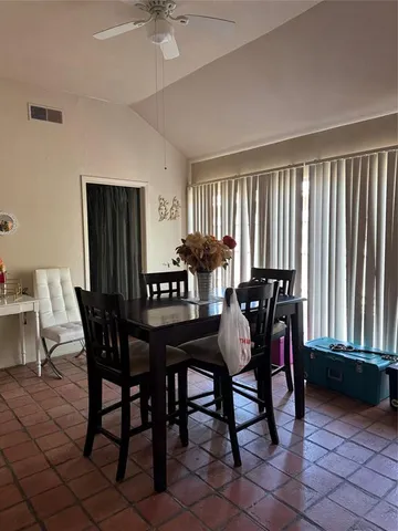 a view of storage and utility room with closet