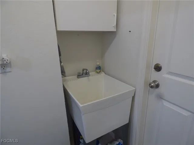 a white bath tub sitting in a bathroom