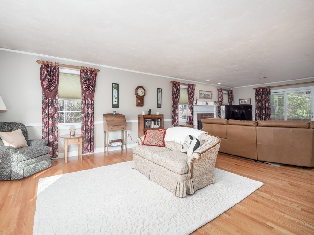 14 Talbott Farm Drive Mendon, MA 01756 - Photo 15 of 40 a living room with furniture and a flat screen tv