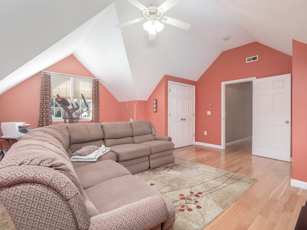 14 Talbott Farm Drive Mendon, MA 01756 - Photo 30 of 40 a living room with furniture and a rug