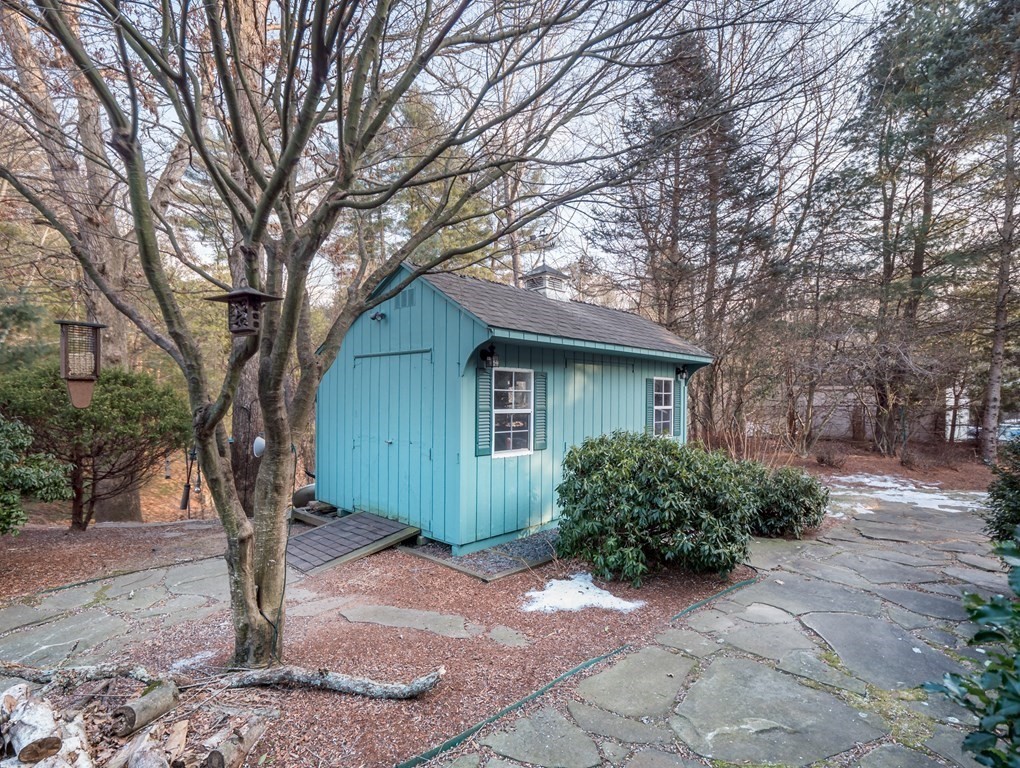 14 Talbott Farm Drive Mendon, MA 01756 - Photo 36 of 40 a house is sitting in middle of the forest