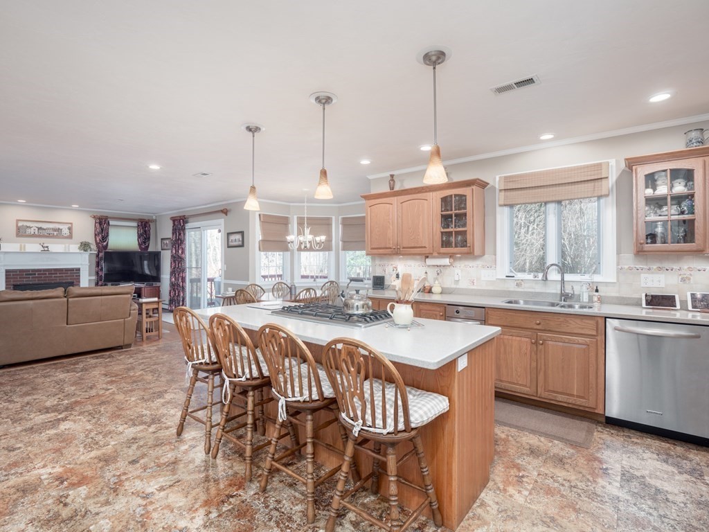 14 Talbott Farm Drive Mendon, MA 01756 - Photo 6 of 40 a large kitchen with a table and chairs