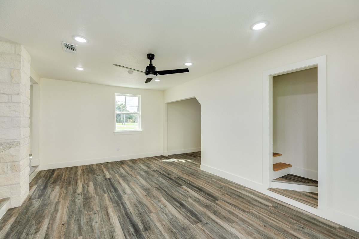 1200 Gifford Lane Angleton, TX 77515 - Photo 17 of 26 a view of empty room with wooden floor