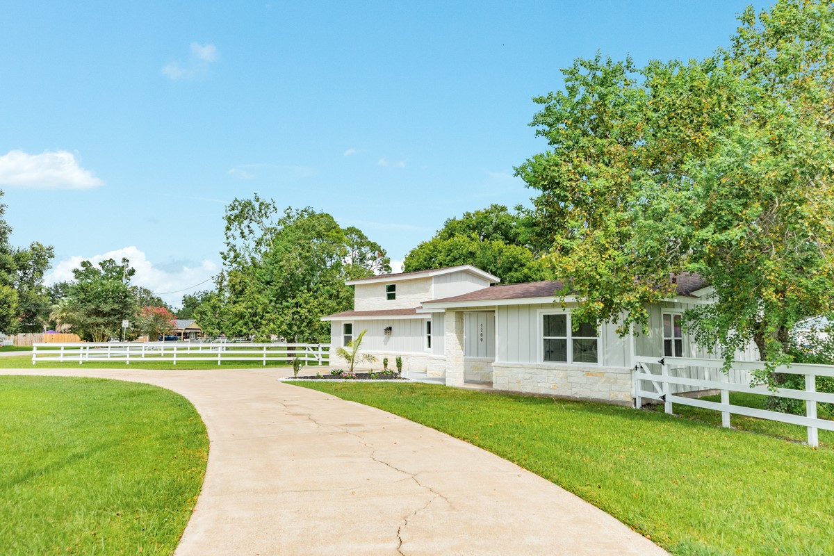 1200 Gifford Lane Angleton, TX 77515 - Photo 2 of 26 a view of a house with a yard