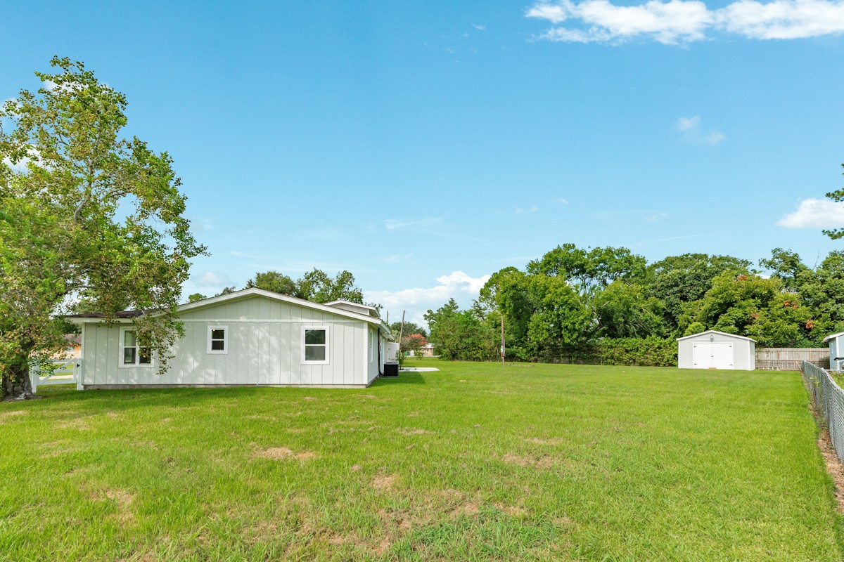 1200 Gifford Lane Angleton, TX 77515 - Photo 8 of 26 a front view of a house with a yard