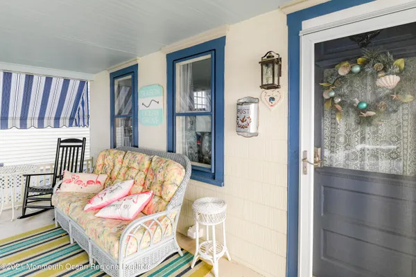a living room with furniture and a table
