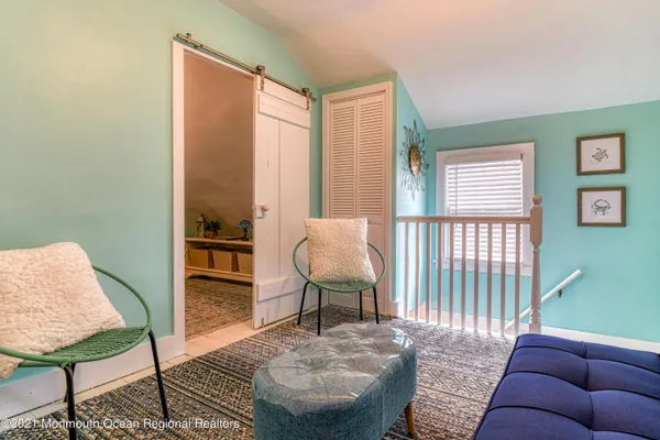 a bedroom with a bed and a table in it