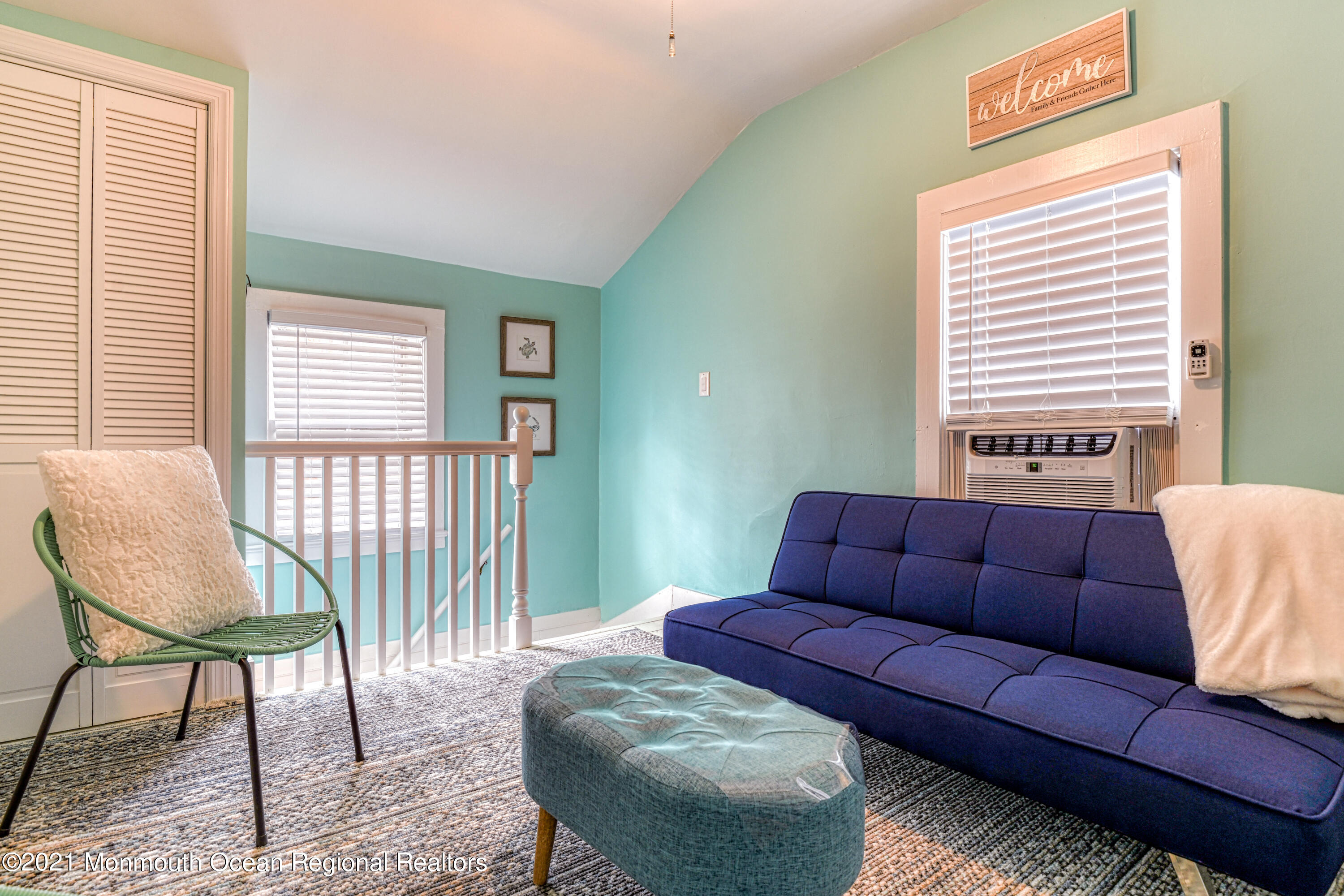87 Embury Avenue Ocean Grove, NJ 07756 - Photo 28 of 55 a living room with furniture and a window