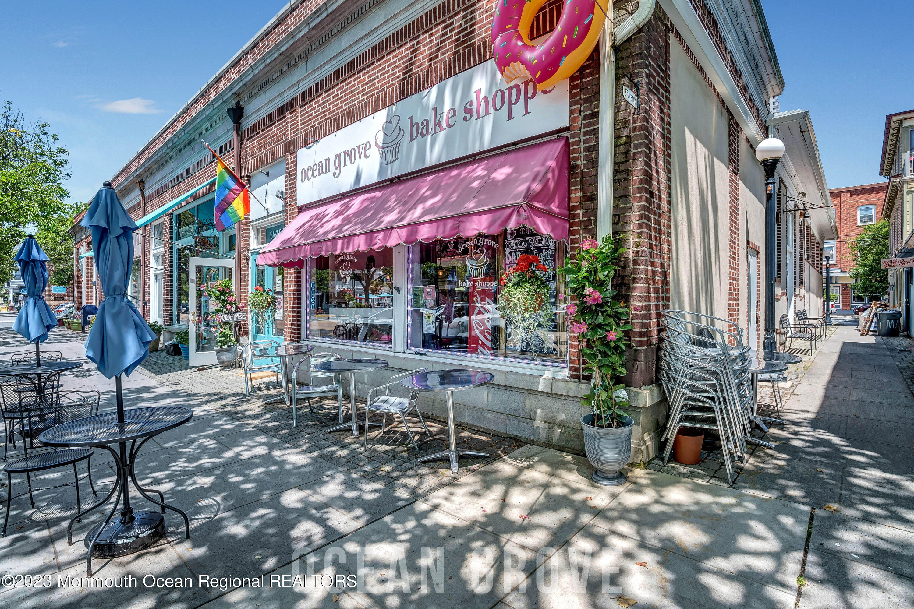 87 Embury Avenue Ocean Grove, NJ 07756 - Photo 36 of 55 a view of a chairs and tables in patio