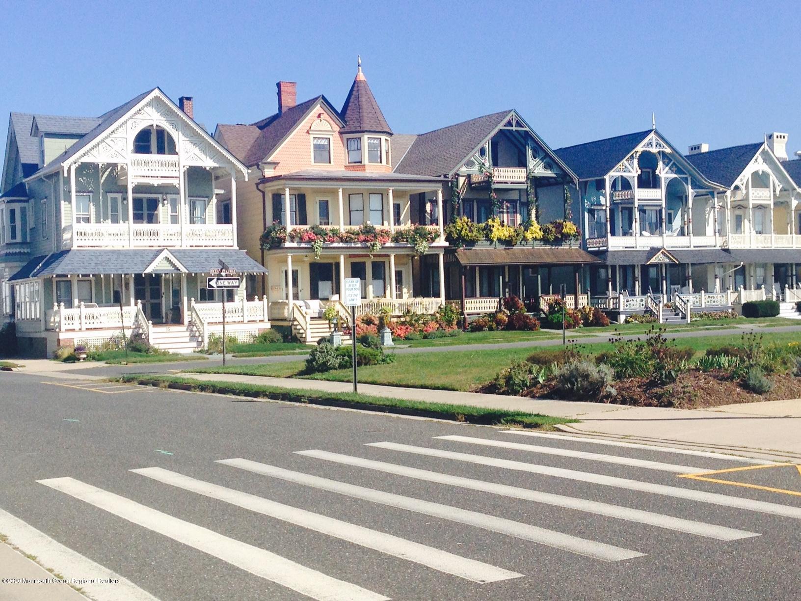 87 Embury Avenue Ocean Grove, NJ 07756 - Photo 41 of 55 a front view of residential houses with yard