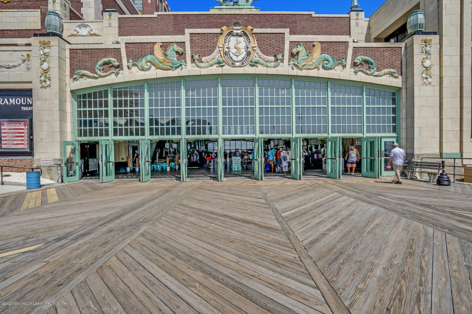 87 Embury Avenue Ocean Grove, NJ 07756 - Photo 48 of 55 a view of a building with a lot of people on a street
