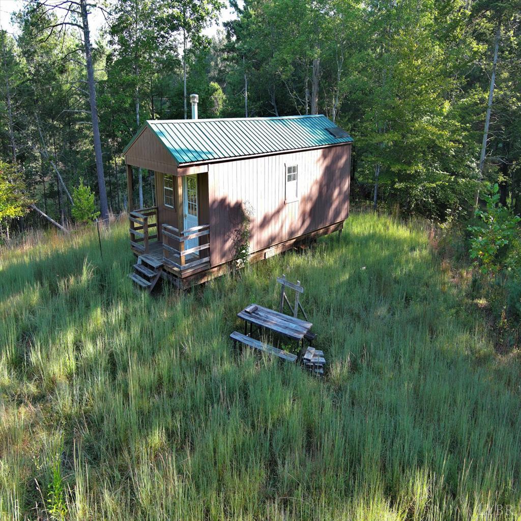 0 Dancing Creek Road Monroe, VA 24574 - Photo 2 of 13 a backyard of a house with table and chairs