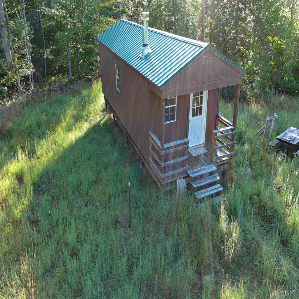0 Dancing Creek Road Monroe, VA 24574 - Photo 3 of 13 a backyard of a house with table and chairs