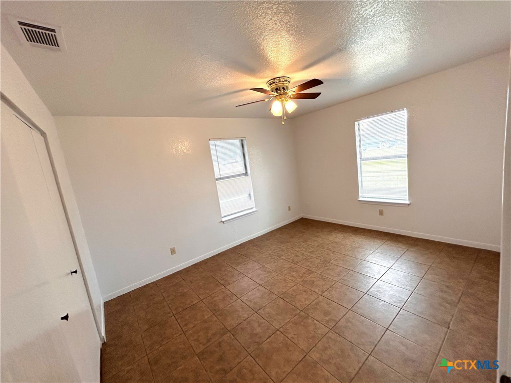 10411 Chaparral Road Killeen, TX 76548 - Photo 12 of 13 a view of an empty room with a window