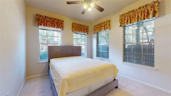 a bathroom with a mirror sink and vanity