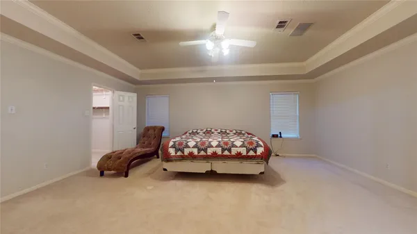 a spacious bathroom with a double vanity sink and mirror
