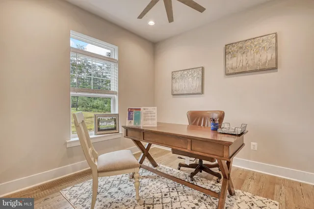 a workspace with furniture and window