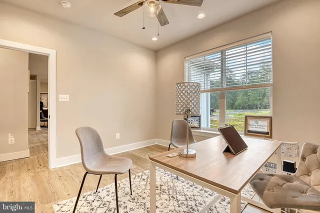 a workspace with furniture and window