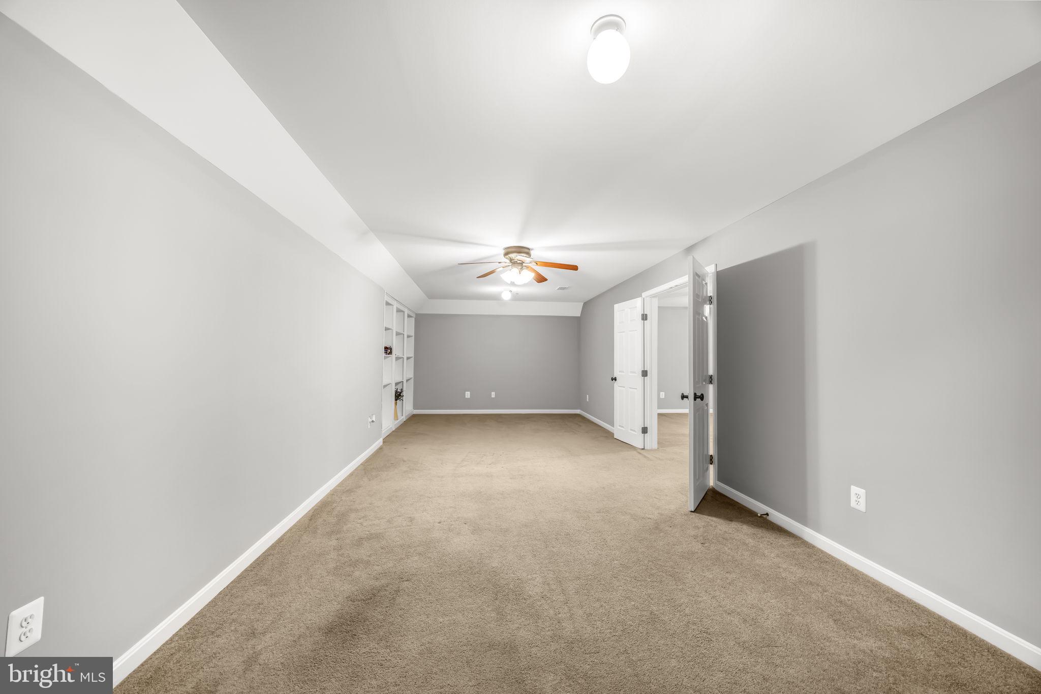 6657 Lawyers Road Spotsylvania, VA 22551 - Photo 37 of 73 an empty room with a ceiling fan and window