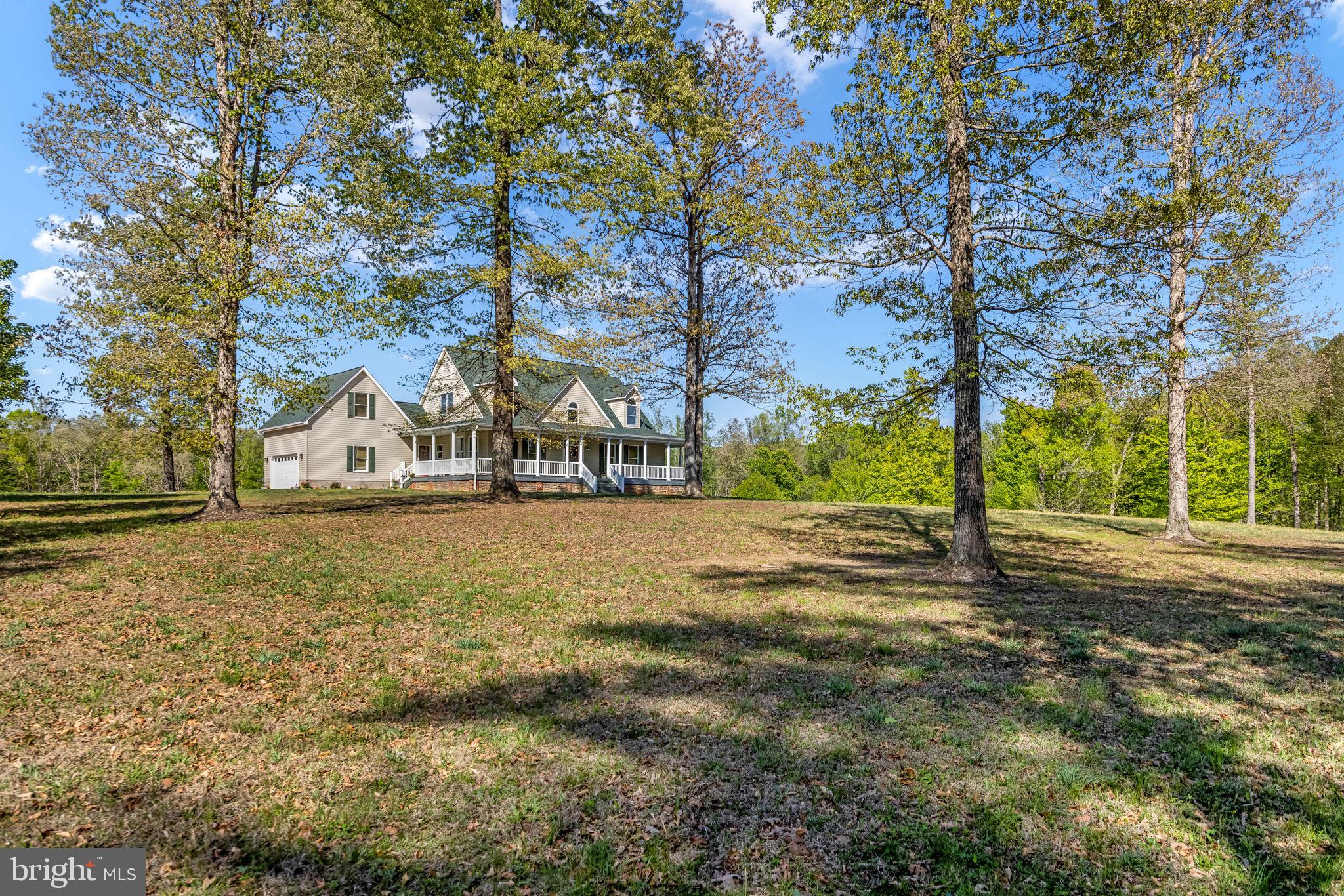 6657 Lawyers Road Spotsylvania, VA 22551 - Photo 4 of 73 a view of road with trees