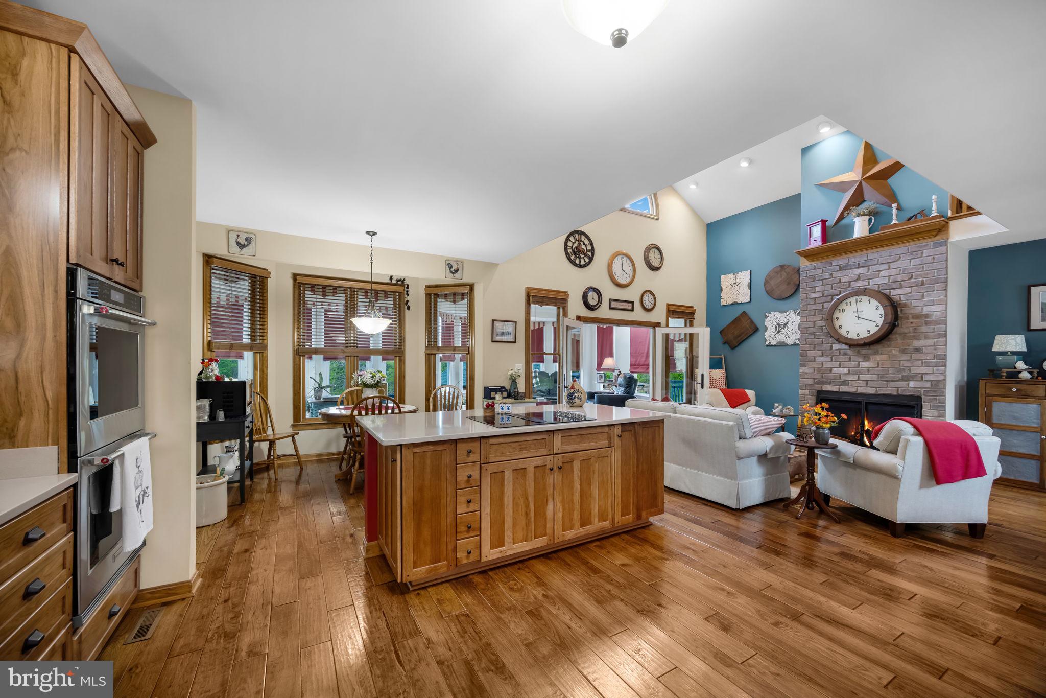 6657 Lawyers Road Spotsylvania, VA 22551 - Photo 8 of 73 a living room with furniture and wooden floor