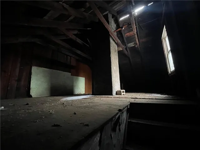 a kitchen with a stove and a microwave