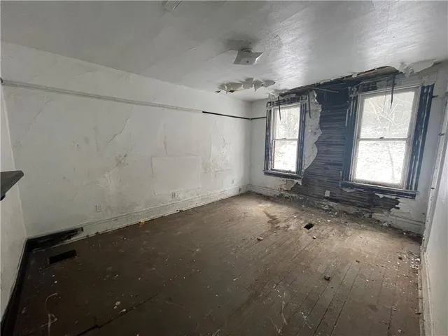 an empty room with windows