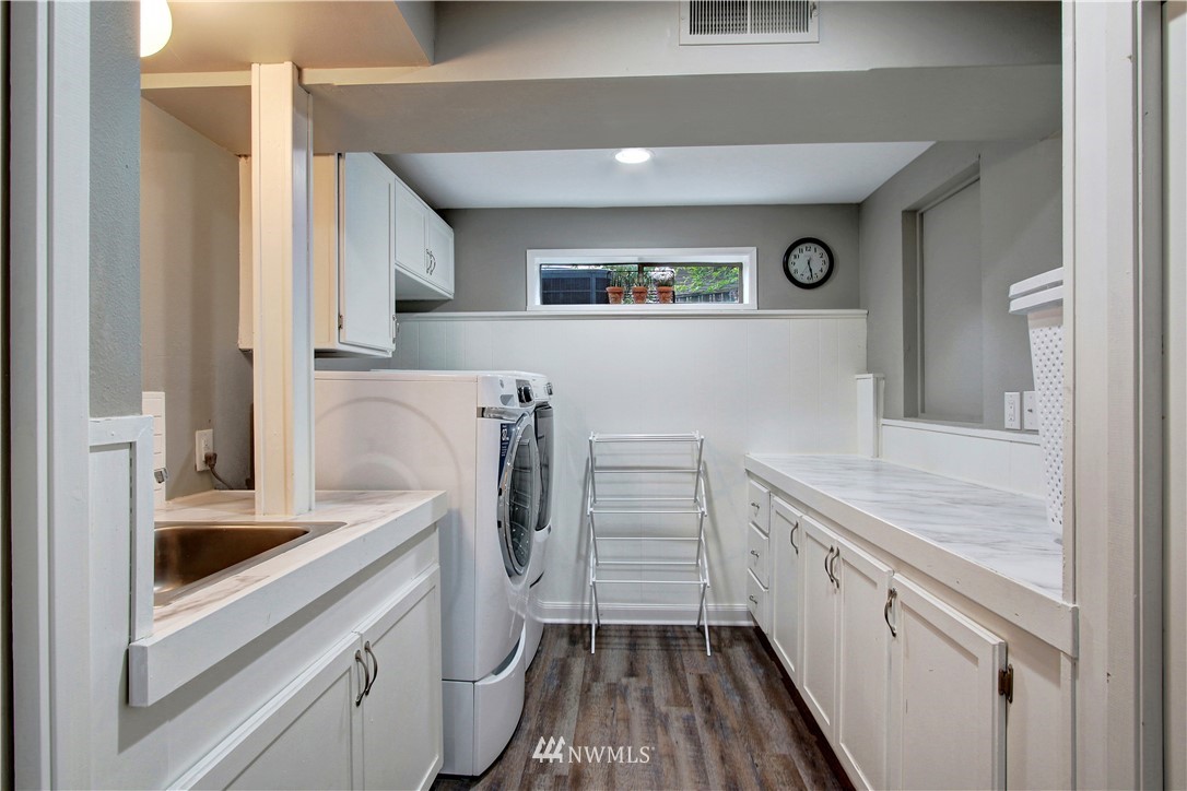 8604 Talbot Road Edmonds, WA 98026 - Photo 21 of 34 a view of a kitchen with appliances and cabinets
