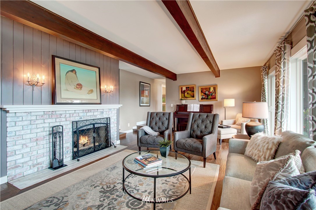 8604 Talbot Road Edmonds, WA 98026 - Photo 5 of 34 a living room with furniture and a fireplace