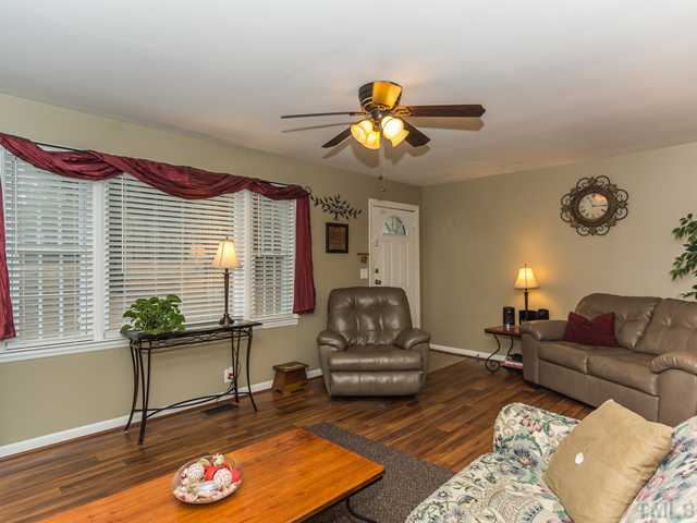 4605 Inwood Road Raleigh, NC 27603 - Photo 2 of 19 Laminate floors through living room and bedrooms!