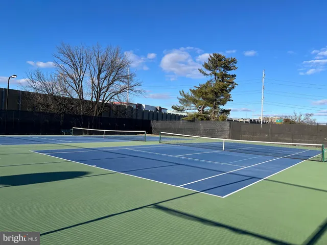 a bench sitting in the middle of a yard