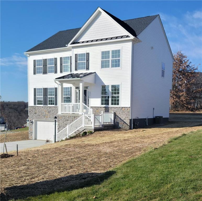 236 Wyncrest Drive Butler, PA 16001 - Photo 1 of 23 a front view of a house with a yard