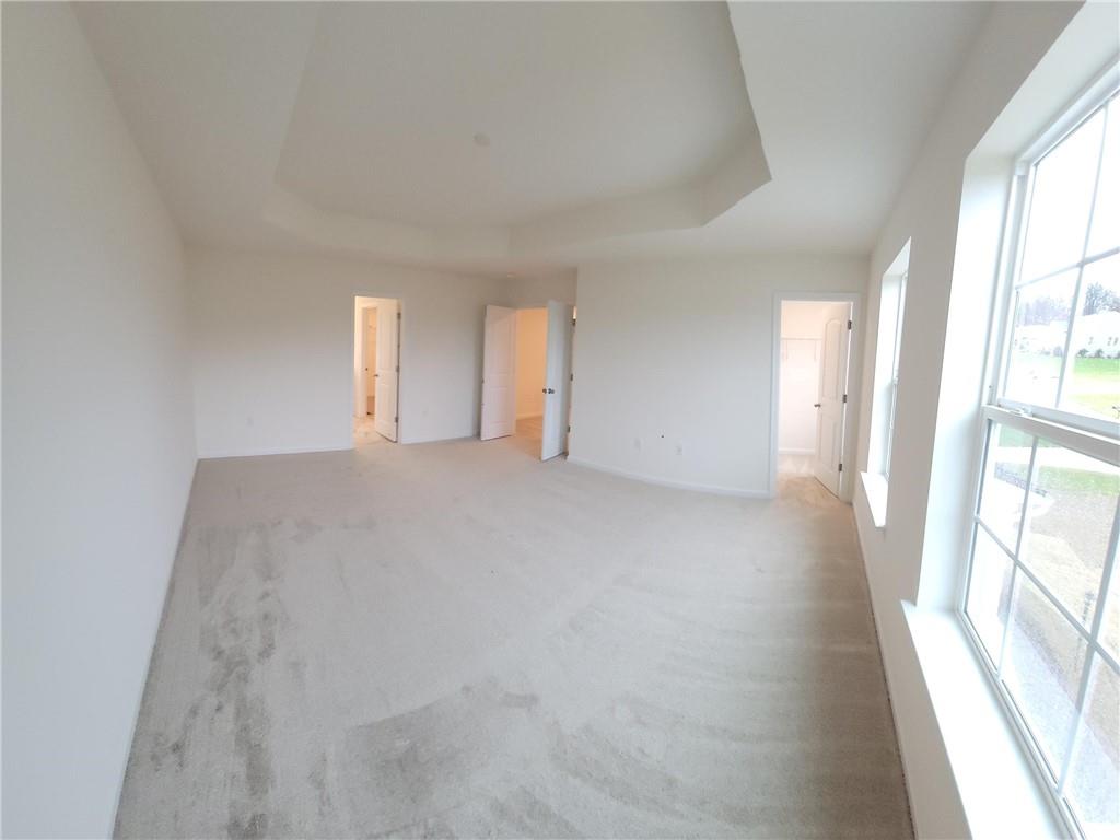 236 Wyncrest Drive Butler, PA 16001 - Photo 12 of 23 a view of a big room with windows and chandelier