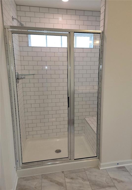 236 Wyncrest Drive Butler, PA 16001 - Photo 14 of 23 a bathroom with a glass shower door